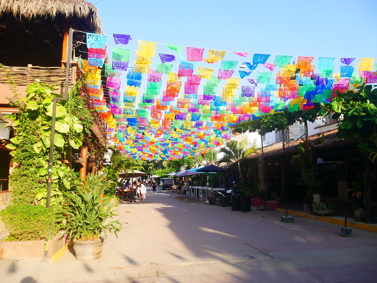 Avenida Tercer Mundo in San Pancho decorated with colorful papel picado